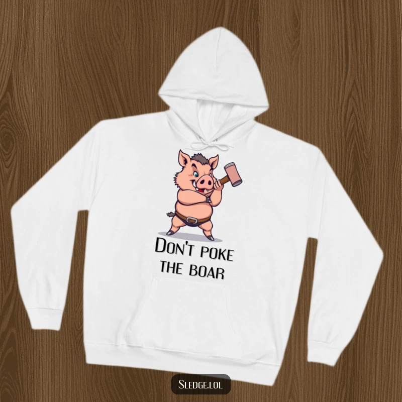 Funny Boar Hoodie: A powerful boar swings a small sledgehammer, ready for action, embodying funny, unstoppable force and determination.