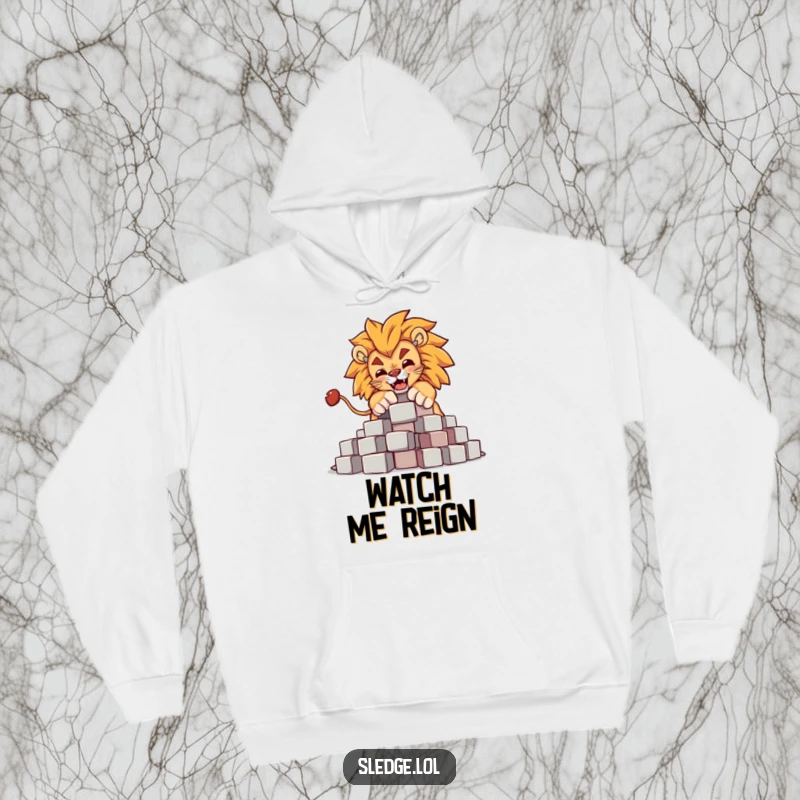 Funny Lion Hoodie: A powerful lion is humorously depicted knocking over a pile of blocks, radiating funny, regal energy and playful might.
